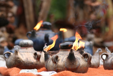 Arabic Oil Lamp with flames coming out of the pipes.の写真素材