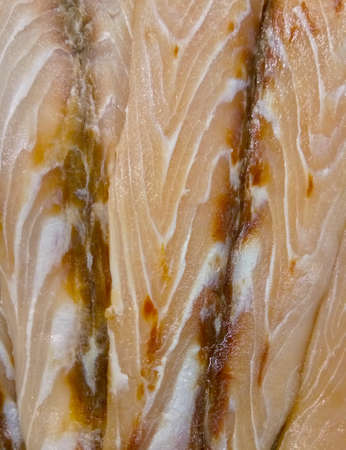Salmon meat fat line. It appears that the salmon is paler than usual. Streak like pattern on woodの写真素材