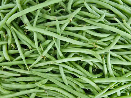 A close up photo of stack of long beans in the fresh ingredient market