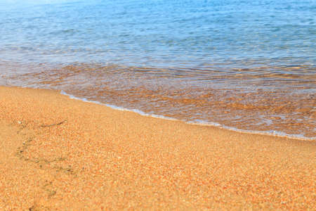 Blue clear water. Sea, lake, sun, beach, vacation Background for inserting images and text. Tourism, travel.の写真素材