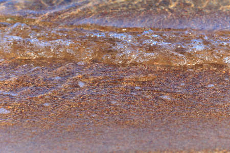 Blue clear water. Sea, lake, sun, beach, vacation Background for inserting images and text. Tourism, travel.の写真素材
