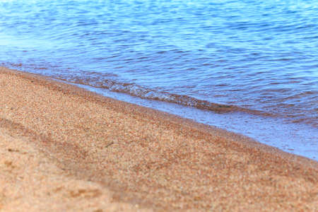 Blue clear water. Sea, lake, sun, beach, vacation Background for inserting images and text. Tourism, travel concept photoの写真素材