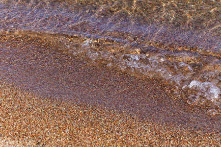Blue clear water. Sea, lake, sun, beach, vacation Background for inserting images and text. Tourism, travel.の写真素材