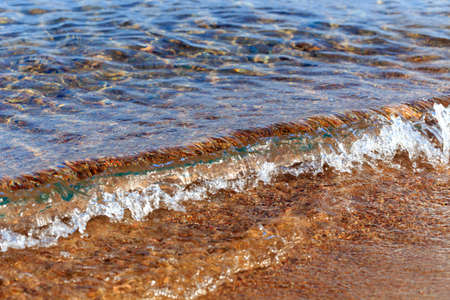 Blue clear water. Sea, lake, sun, beach, vacation Background for inserting images and text. Tourism, travel concept photoの写真素材
