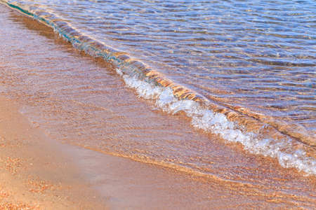 Blue clear water. Sea, lake, sun, beach, vacation Background for inserting images and text. Tourism, travel.の写真素材