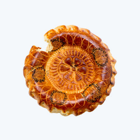 Baked round traditional Asian tandoor bread isolated on white background. Orient, asian, indian cuisine.の写真素材