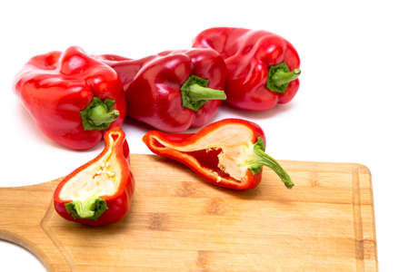 Red pepper on white background. Natural farm product. Image for cafe advertising, food.の写真素材