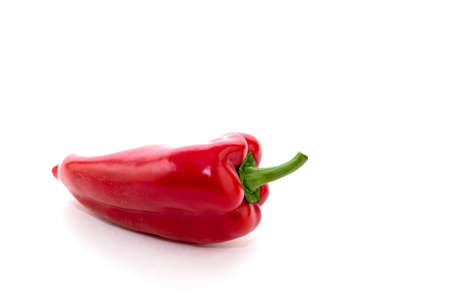 Red pepper on white background. Natural farm product. Image for cafe advertising, food.の写真素材