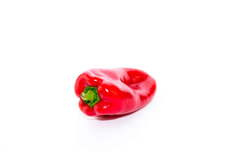 Red pepper on white background. Natural farm product. Image for cafe advertising, food.の写真素材