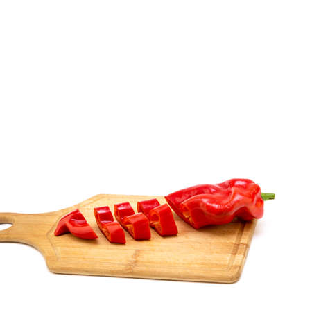 Red pepper on white background. Natural farm product. Image for cafe advertising, food.の写真素材