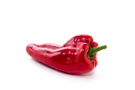 Red pepper on white background. Natural farm product. Image for cafe advertising, food.の写真素材