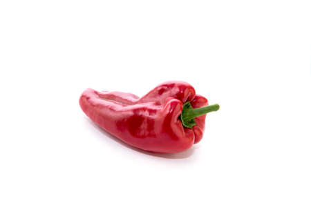 Red pepper on white background. Natural farm product. Image for cafe advertising, food.の写真素材