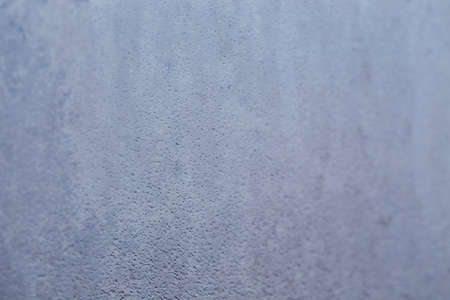 Winter ice pattern on the frozen window. Texture, background for inserting text. New Year theme. Winter. Cold.の写真素材