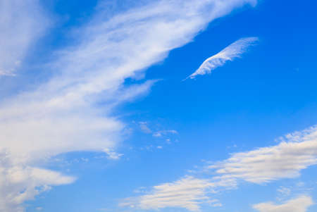 Blue sky with white cumulus clouds. Abstract natural background.