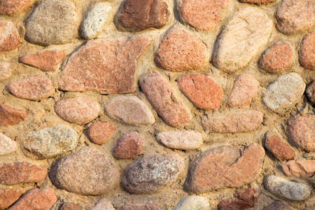 Texture of stone old wall. Natural background. surface of the marble with brown tint