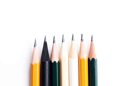 Background with white paper and pencils. Workplace for the artist and illustrator. Background to display the logo and lettering. copyspace, space for text. Office tools.の写真素材