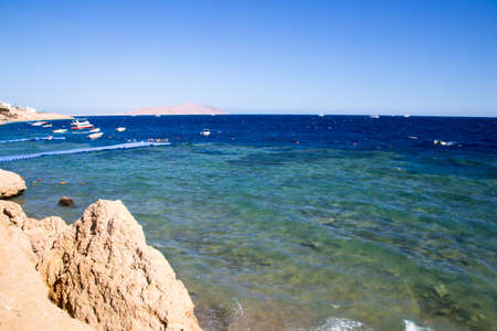Coast of the Red Sea, Egypt. surf line. Wind and waves. A little storm. Background tourism and...