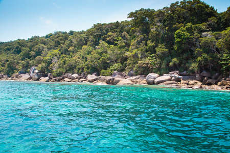 National park, beautiful blue sea. White boats with tourists.の写真素材