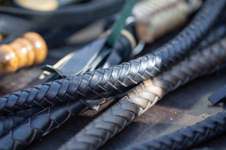 handles woven leather whips. texture of vintage instruments.の写真素材