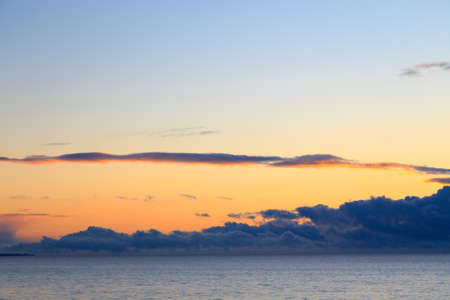 Pink vanilla heaven. Bright blue sky with gentle cumulus clouds.