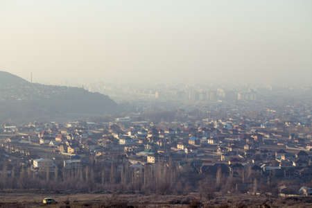 City view with fog. Kyrgyzstan, Bishkek Central Asia