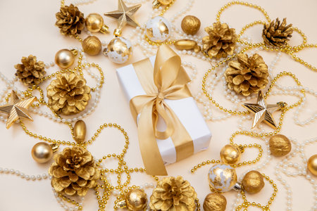 Stylish holiday background perfect for greeting cards, banners, or product mockups. Cozy golden tones evoke celebration and luxury.の写真素材