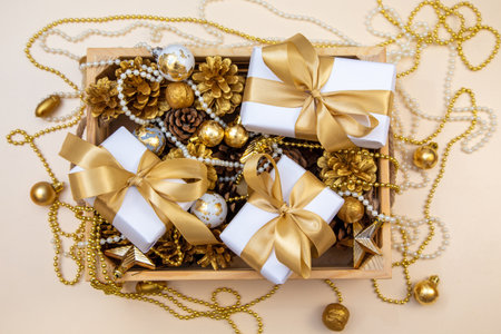 Elegant still life for cozy festive design, natural textures meet luxury golden decor.の写真素材