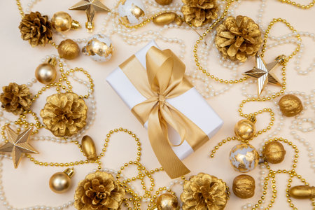 Stylish holiday background perfect for greeting cards, banners, or product mockups. Cozy golden tones evoke celebration and luxury.の写真素材