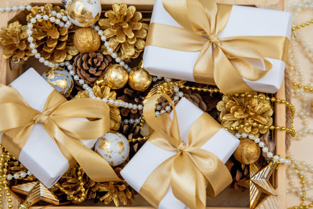 Elegant still life for cozy festive design, branding, or greeting cards natural textures meet luxury golden decor.の写真素材