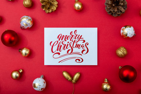 Merry Christmas and Happy New Year greeting card, frame, and banner. Holidays design. Noel and Feliz Navidad. Christmas gifts and decorations, top view. Flat lay.