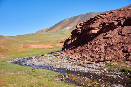 Colored mountains in Kichik-Alai valley in Kyrgyzstanの写真素材