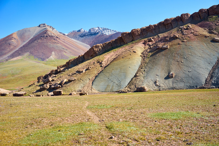 Colored mountains in Kichik-Alai valley in Kyrgyzstanの写真素材