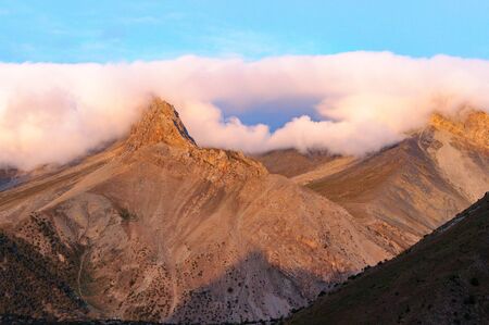 pink mountains under the cloudsの写真素材