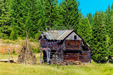 Old traditional Udmurt wooden house near the forestの写真素材