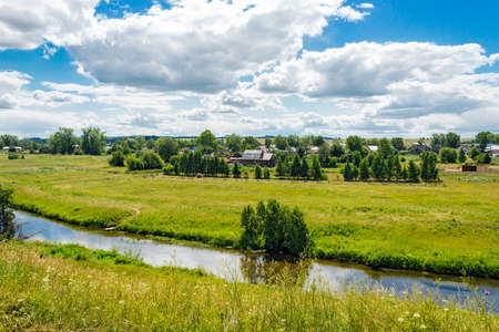 View of the rural landscape and the river a sunny summer dayの写真素材