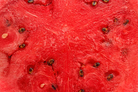 A slice of juicy ripe red watermelon closeupの写真素材