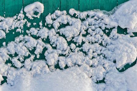 background of the blue boards in the snowの写真素材