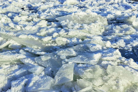 winter texture of broken ice close up