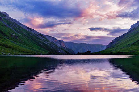 lake in the caucasus mountains on a summer morningの写真素材