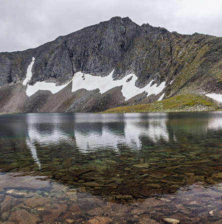 landscape mountain lake on cloudy summer dayの写真素材