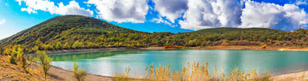 View of the lake and mountains in Crimea on a sunny autumn dayの写真素材