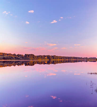calm vyatka river at sunset on a summer eveningの写真素材