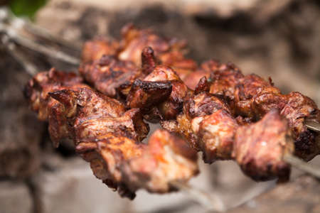 Barbecue, grilled meat outdoorsの写真素材