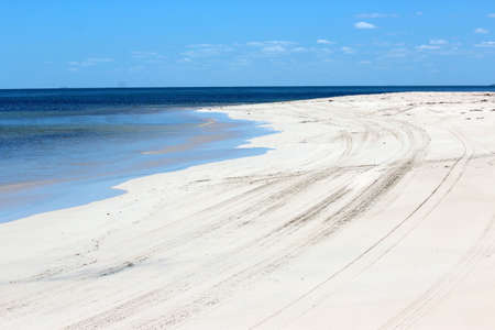 Indian Ocean lapping on White sand on south west Australian beachの写真素材
