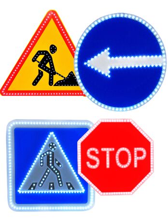 Different colored road signs isolated on white background.の写真素材