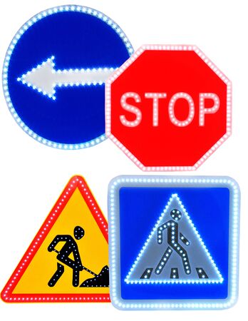 Different colored road signs isolated on white background.の写真素材