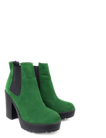 Female green suede boots on white background, isolated product, top view. heeled shoesの写真素材