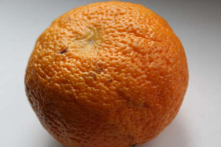 Beautiful orange tangerine, porous texture of tangerine skin