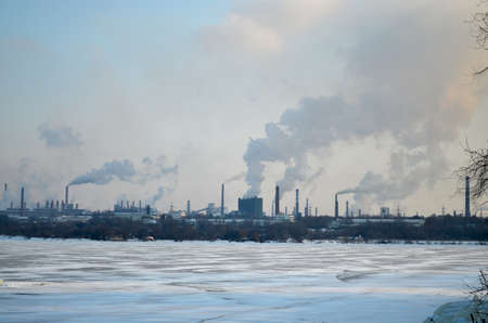industrial city, smoking plant, frozen river
