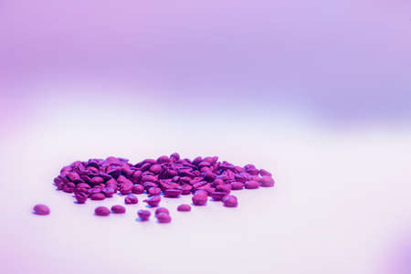 coffee beans in pink and blue colors. art background